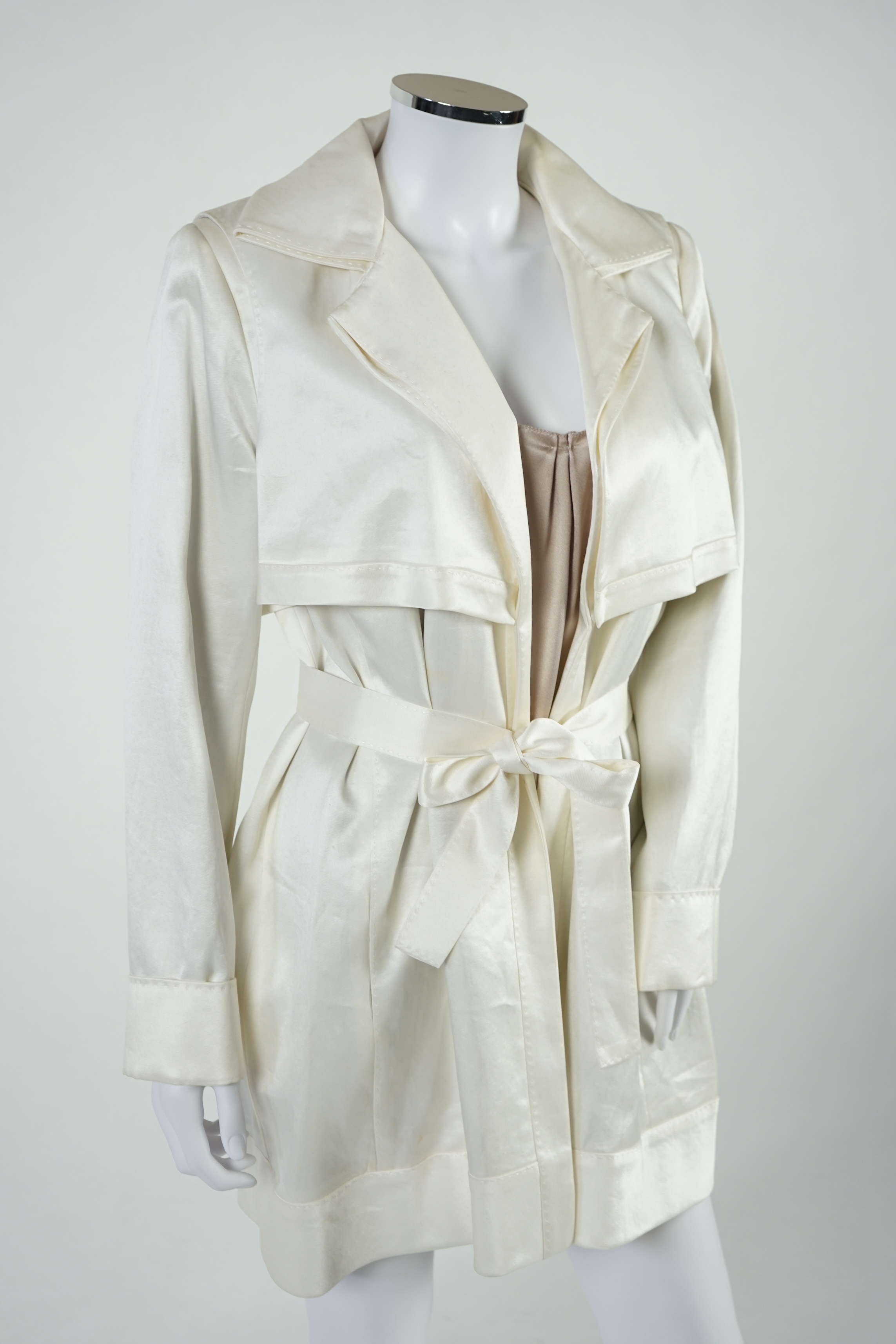 A cream Amanda Wakeley silk jacket and fawn silk sleeveless top. Approx size 14 Proceeds to Happy Paws Puppy Rescue